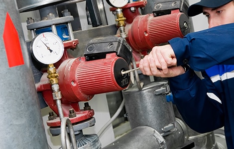 Heating and Plumbing Services on Commercial Machinery